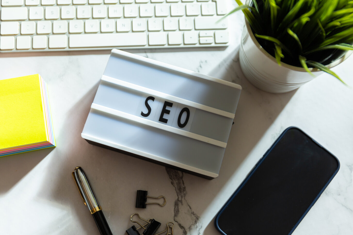 Office desk showing custom SEO services.